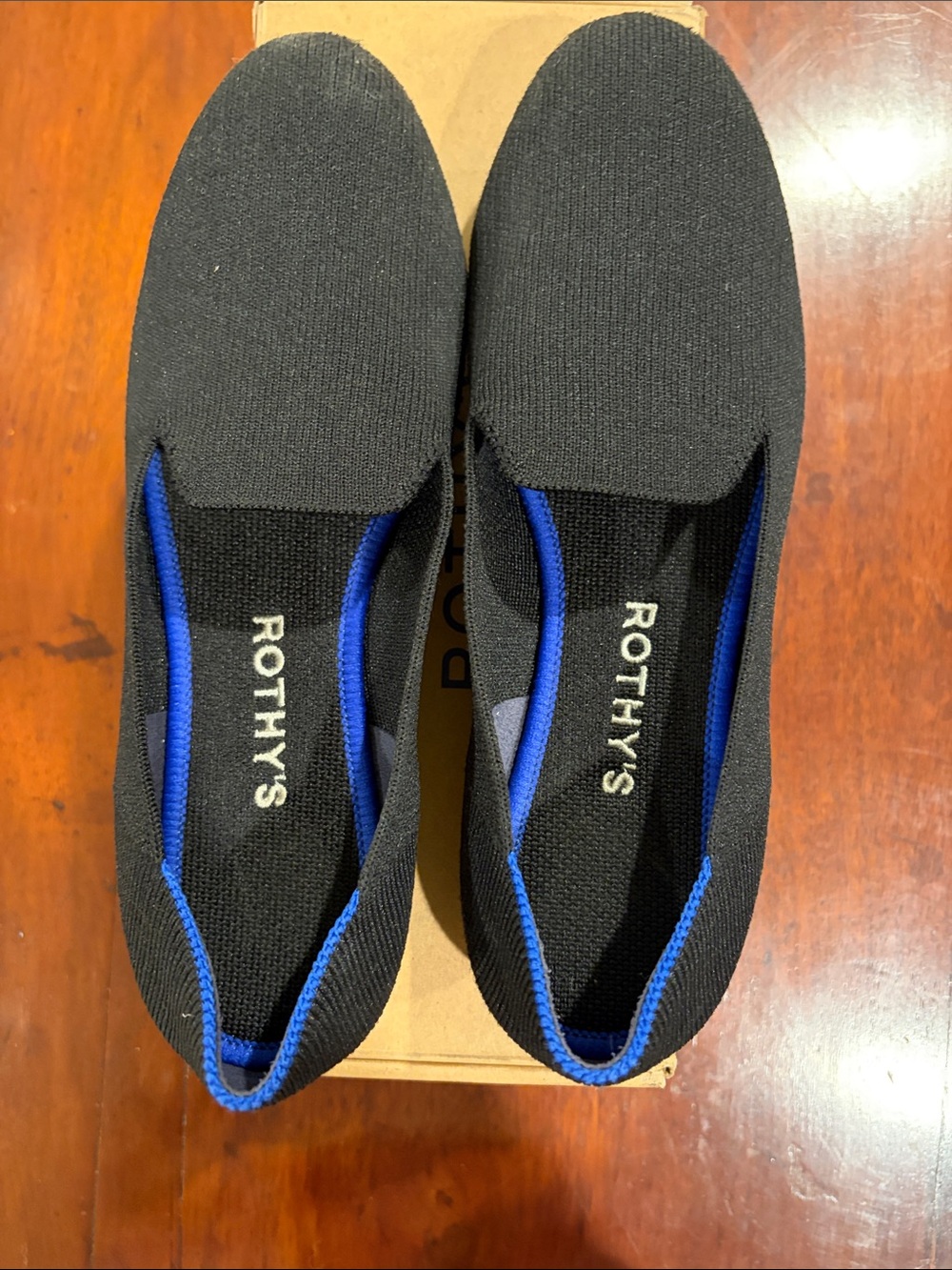 Rothy's Black Flats with Blue Trim